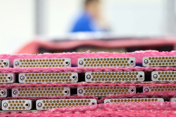 A lot of D-sub connectors. Panels with a number of connectors are stacked.